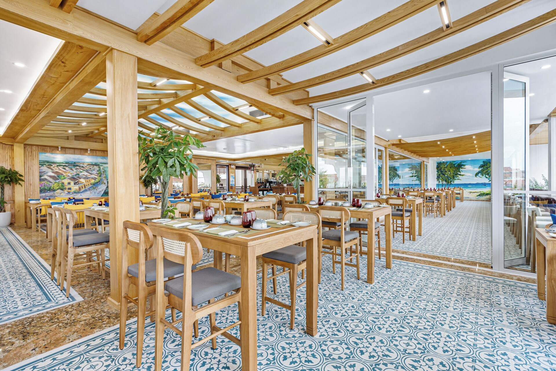 Lobby lounge vignette with modern furniture at Wafaifo Resort Hội An