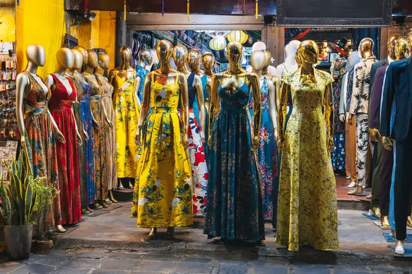 Fashionable clothes displayed on mannequins in Hội An