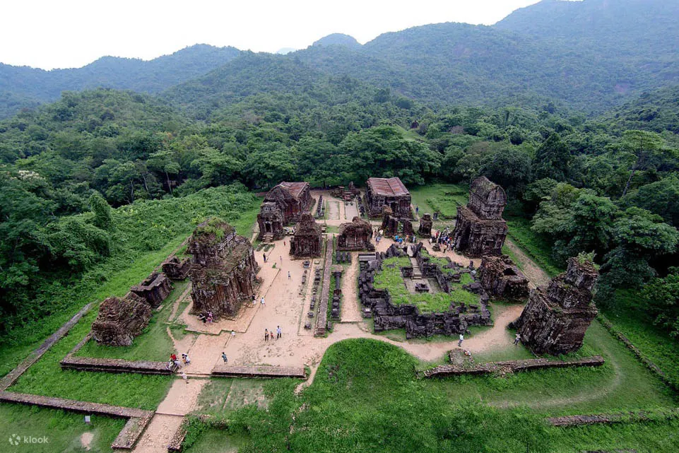 Cham towers framed by jungle hills