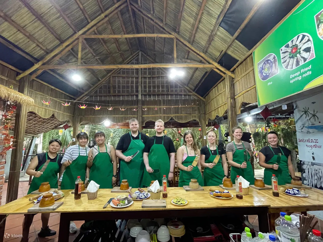 Guests learning Vietnamese cooking techniques near Hội An